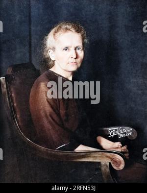 Marie Curie (1867-1934) was a Polish-French physicist and chemist and multiple Nobel laureate. Her achievements included a theory of radioactivity (a term that she coined), techniques for isolating radioactive isotopes, and the discovery of two elements, polonium and radium. Photographed by Frank Henri Jullien, 1922. Stock Photo