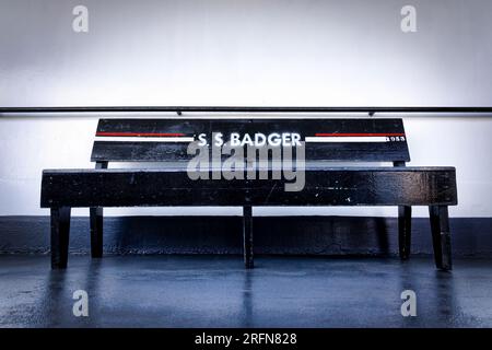 A bench onboard the SS Badger, a car ferry and National Historic Landmark with a regular Lake Michigan route between Ludington, Michigan and Manitowoc Stock Photo