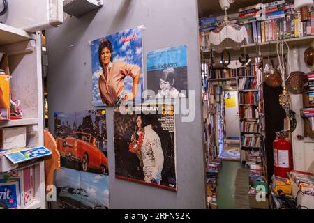 Signs and symbols, a flea market, records on a wall, Carola Häggkvist and Elvis Presley. Stock Photo