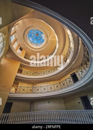 Upwards view architecture interior details of a big round storied hall with glass dome Stock Photo