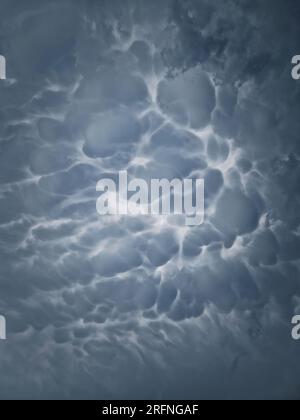 Mammatus cloud formations. Abstract background of wonderful storm cloudscape. Dreamlike sky texture, celestial magic Stock Photo