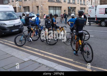Glasgow, Scotland, UK. 4th Aug, 2023. UCI road race circuit practice day with cyclist, team cars, police all getting familiarised with the city centre circuit. Credit R.Gass/Alamy Live News Stock Photo