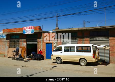 Tapiceria / upholstery / vehicle trimming shop for making and repairing seats for vehicles next to main road, El Alto, Bolivia Stock Photo