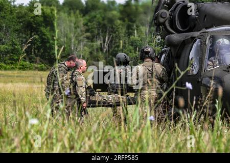 Members of the 910th Security Forces Squadron pose for a photo with ...