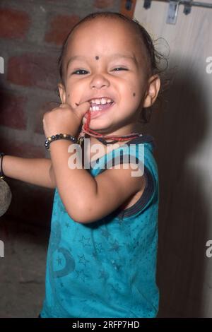 Cheerful Indian newborn baby close up Stock Photo - Alamy