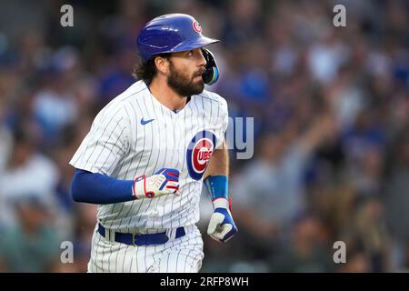 Chicago Cubs' Dansby Swanson watches the flight of the ball during