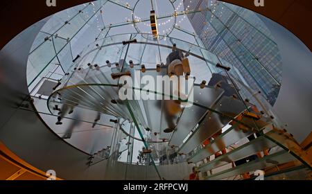 Modern Glass Staircase Silhouette of walking People in shanghai china. Stock Photo