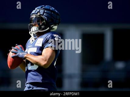 Seattle Seahawks running back Ricky Watters carries the ball