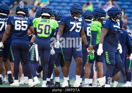 Seattle Seahawks offensive tackle Greg Eiland (75) goes for a block during  an NFL pre-season football game against the Minnesota Vikings, Thursday,  Aug. 10, 2023 in Seattle. (AP Photo/Ben VanHouten Stock Photo 