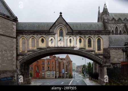 Dublin, Ireland - July 23rd 2023: carved limestone enclosed footbridge over road, built c.1875, connecting Christ Church Cathedral with Synod Hall Stock Photo