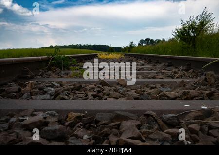 Low angle view of abandoned railroad tracks Stock Photo