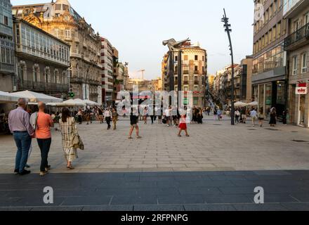 People in pedestrianised central square, Praza Porto do Sol plaza, city centre of Vigo, Galicia, Spain Stock Photo