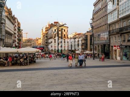 People in pedestrianised central square, Praza Porto do Sol plaza, city centre of Vigo, Galicia, Spain Stock Photo