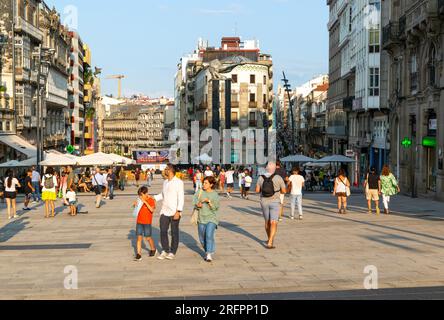 People in pedestrianised central square, Praza Porto do Sol plaza, city centre of Vigo, Galicia, Spain Stock Photo