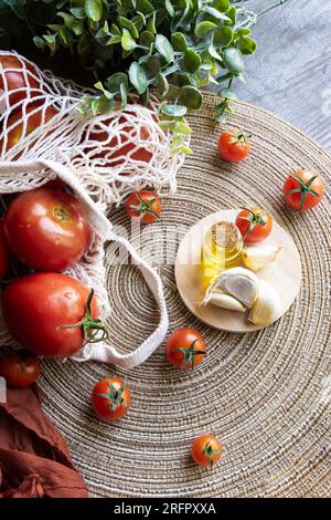 Tomatoes And Extra Virgin Olive Oil Reflected On White Background Stock 