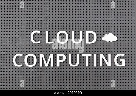 Cloud computing concept. Plastic letters message on gray board Stock Photo