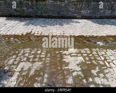 Oos, Oosbach Fluß durch Baden-Baden mit Niederwasser im Juli 2023 Stock Photo