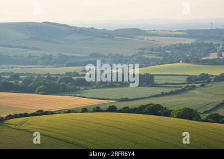 Beautiful Summer sunset from Firle Beacon in South Downs National Park in beautiful English countryside Stock Photo
