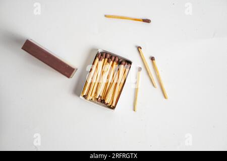 Half opened blank matchbox with matches inside isolated on white Stock Photo