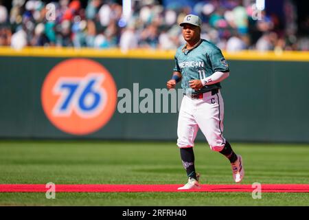 American League's José Ramírez, of the Cleveland Guardians, celebrates a  base hit during the MLB All-Star baseball game against the National League  in Seattle, Tuesday, July 11, 2023. (AP Photo/Lindsey Wasson Stock