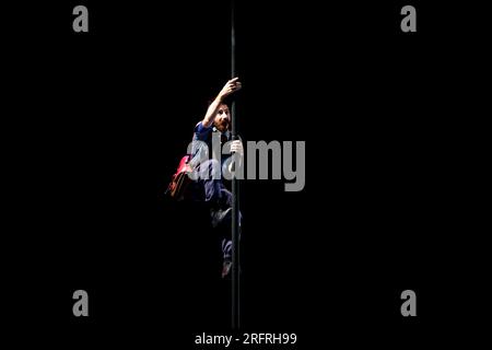 Madrid, Madrid, Spain. 2nd Aug, 2023. Several artists from the 'Faltan 7' company are seen on stage during the 'Express' circus show as part of the activities of the 39th edition of Veranos de la Villa, at the Theater of the Conde Duque Cultural Center, in Madrid (Spain). 'Express' is a fresh show, created collectively to surprise and drive the public crazy in which humor is combined with various circus disciplines where the presence of female acrobatic portes, stands out, as well as techniques such as the Chinese mast, the verticals, the clown and balances. 'Faltan 7' company was born in 201 Stock Photo