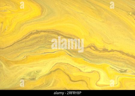 Abstract yellow marble texture background ink pattern with colorful wavy lines. modern stylist yellow liquid marble abstract background made with flui Stock Photo