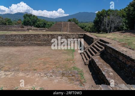 The ancient ball court and seven layer pyramid in the archaeological site of Tingambato, Michoacan, Mexico. The site was built around AD 450 by an undetermined civilization and only excavated in 1979. Stock Photo