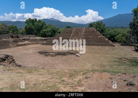 The ancient ball court and seven layer pyramid in the archaeological site of Tingambato, Michoacan, Mexico. The site was built around AD 450 by an undetermined civilization and only excavated in 1979. Stock Photo