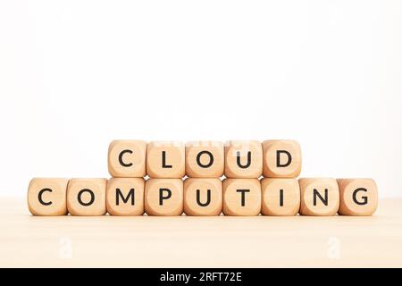 Cloud Computing phrase on wooden blocks. Copy space Stock Photo