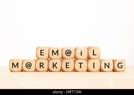 Email Marketing phrase on wooden blocks. Copy space Stock Photo