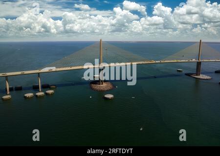 Aerial view of Sunshine Skyway Bridge over Tampa Bay in Florida with moving traffic. Concept of transportation infrastructure Stock Photo
