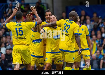 London, UK.  5 August 2023. (C) Mark Noble celebrates scoring the first goal during the Game4Ukraine charity football match at Stamford Bridge, home of Chelsea FC, between former Chelsea striker Andriy Shevchenko’s Team Shevchenko (blue) and current Arsenal full-back Oleksandr Zinchenko’s Team Zinchenko (yellow).  Funds raised will support Ukrainian President Volodymyr Zelensky’s United24 initiative to re-build schools across Ukraine damaged by Russia’s invasion.  Credit: Stephen Chung / Alamy Live News Stock Photo