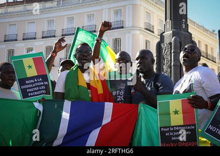 Madrid, Spain. 05th Aug, 2023. Demonstrators hold placards during the demonstration. Senegalese residents of Madrid demonstrate at Puerta del Sol against the illegal arrest of Ousmane Sonko in Senegal, opposition candidate for the presidency of the African country. Credit: SOPA Images Limited/Alamy Live News Stock Photo