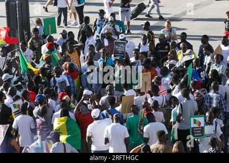 Madrid, Spain. 05th Aug, 2023. A group of demonstrators hold placards during the demonstration. Senegalese residents of Madrid demonstrate at Puerta del Sol against the illegal arrest of Ousmane Sonko in Senegal, opposition candidate for the presidency of the African country. Credit: SOPA Images Limited/Alamy Live News Stock Photo