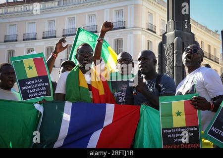 Madrid, Spain. 05th Aug, 2023. Demonstrators hold placards during the demonstration. Senegalese residents of Madrid demonstrate at Puerta del Sol against the illegal arrest of Ousmane Sonko in Senegal, opposition candidate for the presidency of the African country. (Photo by David Canales/SOPA Images/Sipa USA) Credit: Sipa USA/Alamy Live News Stock Photo