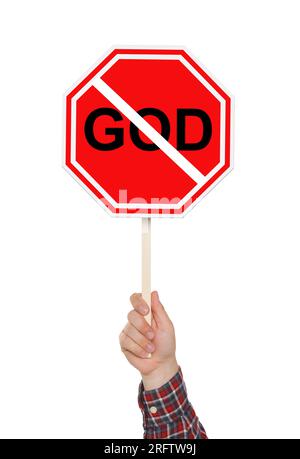 Atheism concept. Man holding prohibition sign with crossed out word God on white background Stock Photo