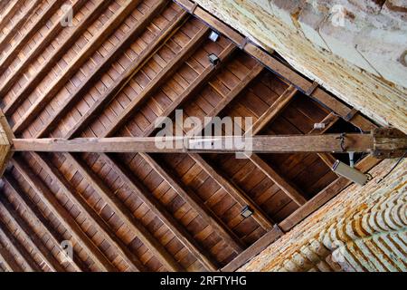 triangular shape view of wooden roof ceiling in french abbaye Stock Photo