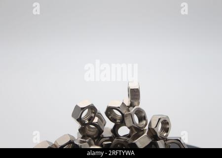 Many nuts touching each other with white background and text area Stock Photo