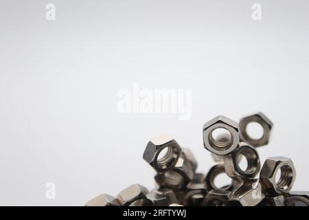 Many nuts touching each other with white background and text area Stock Photo