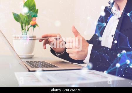 Businessman using a laptop computer chatting Stock Photo