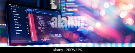 Notebook closeup photo. CSS, JavaScript and HTML usage. Monitor closeup of function source code. Abstract IT technology background. Stock Photo