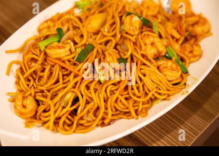 Freshly made shirmp lo mein served for a family Stock Photo