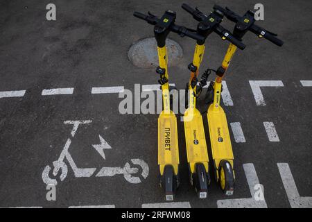 Moscow, Russia. 5th of August, 2023. Electric scooters of the Yandex rental service stand at a rental point on a street in the center of Moscow, Russia Stock Photo