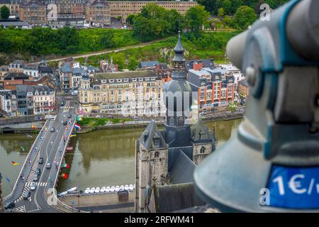 Dinant, Belgium, 03 August 2023: High angle viewpoint on the city of Dinant in the Ardennes of Wallonia, Belgium. River Meuse flowing below, view on C Stock Photo