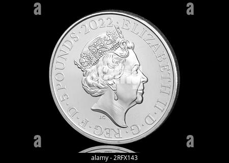 2022 £5 coin featuring the 5th coin portrait of Queen Elizabeth II by Jody Clark.  This coin commemorates the 60th anniversary of The Rolling Stones Stock Photo