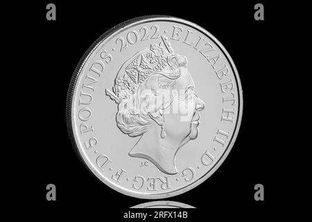 2022 £5 coin featuring the 5th coin portrait of Queen Elizabeth II by Jody Clark.  This coin commemorates the 60th anniversary of The Rolling Stones Stock Photo