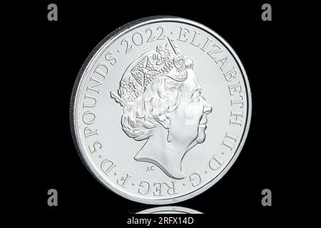 2022 £5 coin featuring the 5th coin portrait of Queen Elizabeth II by Jody Clark.  This coin commemorates the 60th anniversary of The Rolling Stones Stock Photo