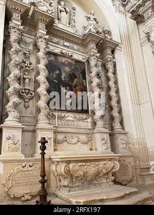 Lecce, Italy. Interior of the 16th century Church of Saint Irene. The altar of the Holy Family. Stock Photo