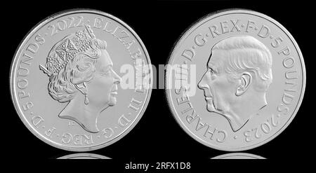 The 5th coin portrait of Queen Elizabeth II by Jody Clark & the 1st coin portrait of King Charles III by Martin Jennings both shown on a UK £5 coin Stock Photo