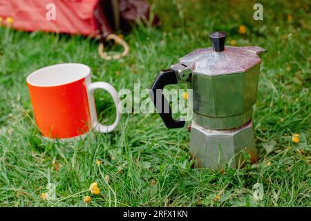 Stovetop espresso maker on camping stove, Fondo, Trentino, Italy Stock  Photo - Alamy